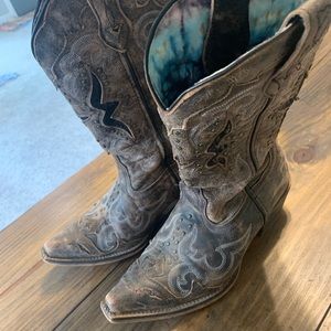 Studded cowgirl boots with pointed toe